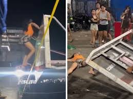 Woman Twerks on Philippines Hoop Before It Collapses