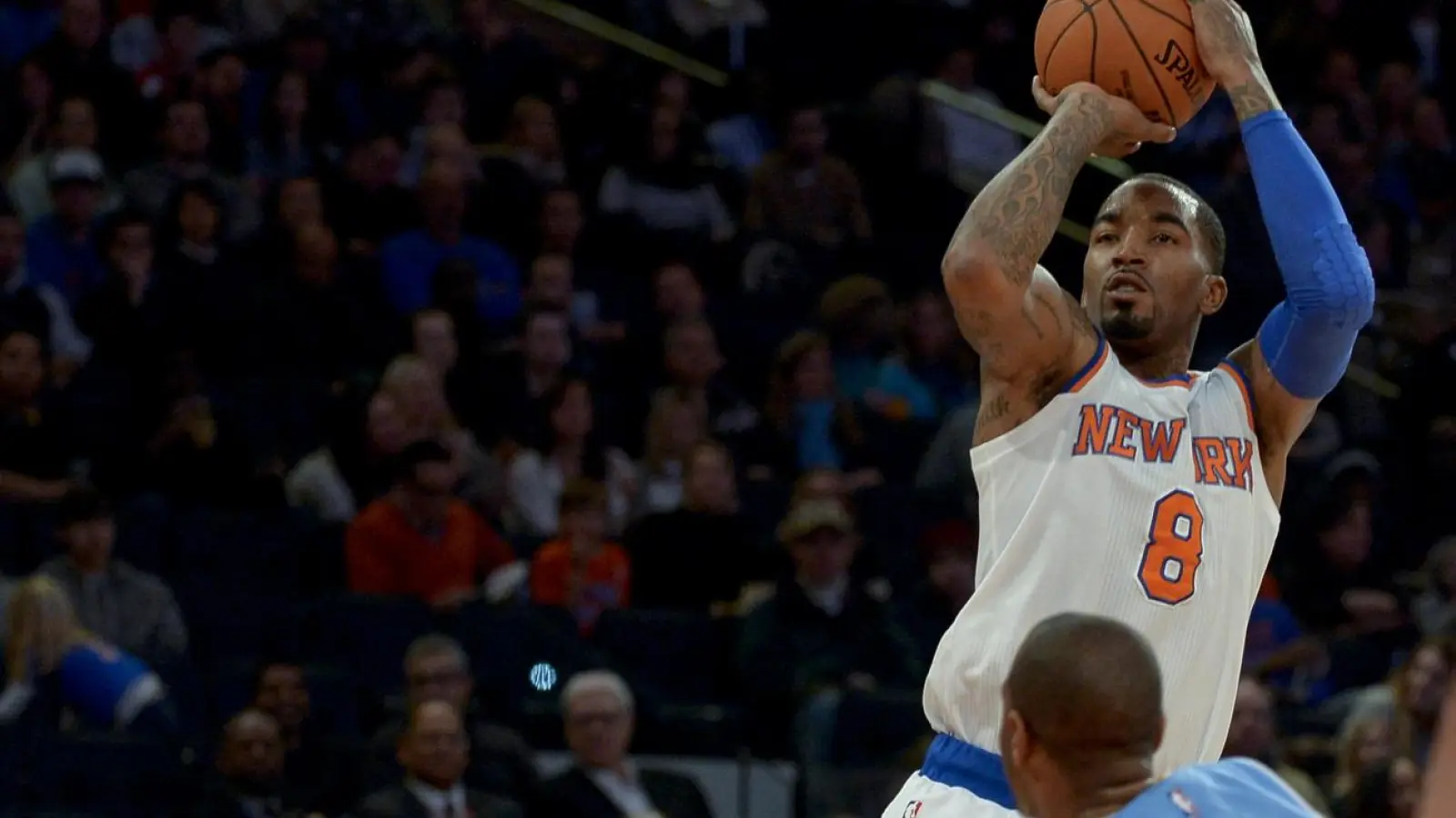 Knicks Crush Sixers in Game 1 as J.R. Smith Tumbles in Fan Surge