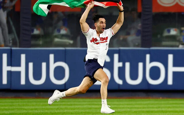 Fan Interrupts Yankee Stadium Game by Running onto Field with Palestinian Flag on 9/11 Anniversary