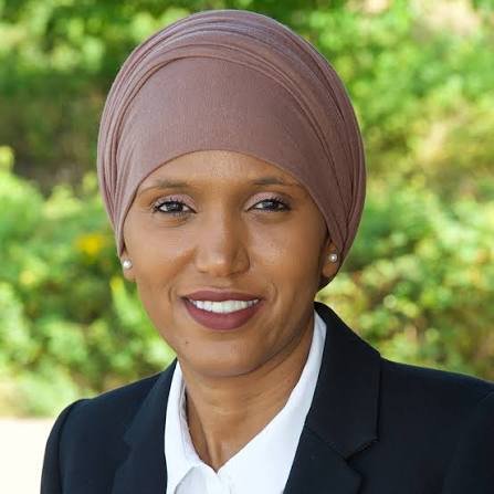 Oregon Commissioner Nafisa Fai Draws Backlash for Attending Rally with Inverted American Flag